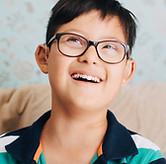 Portrait of a Boy with Glasses